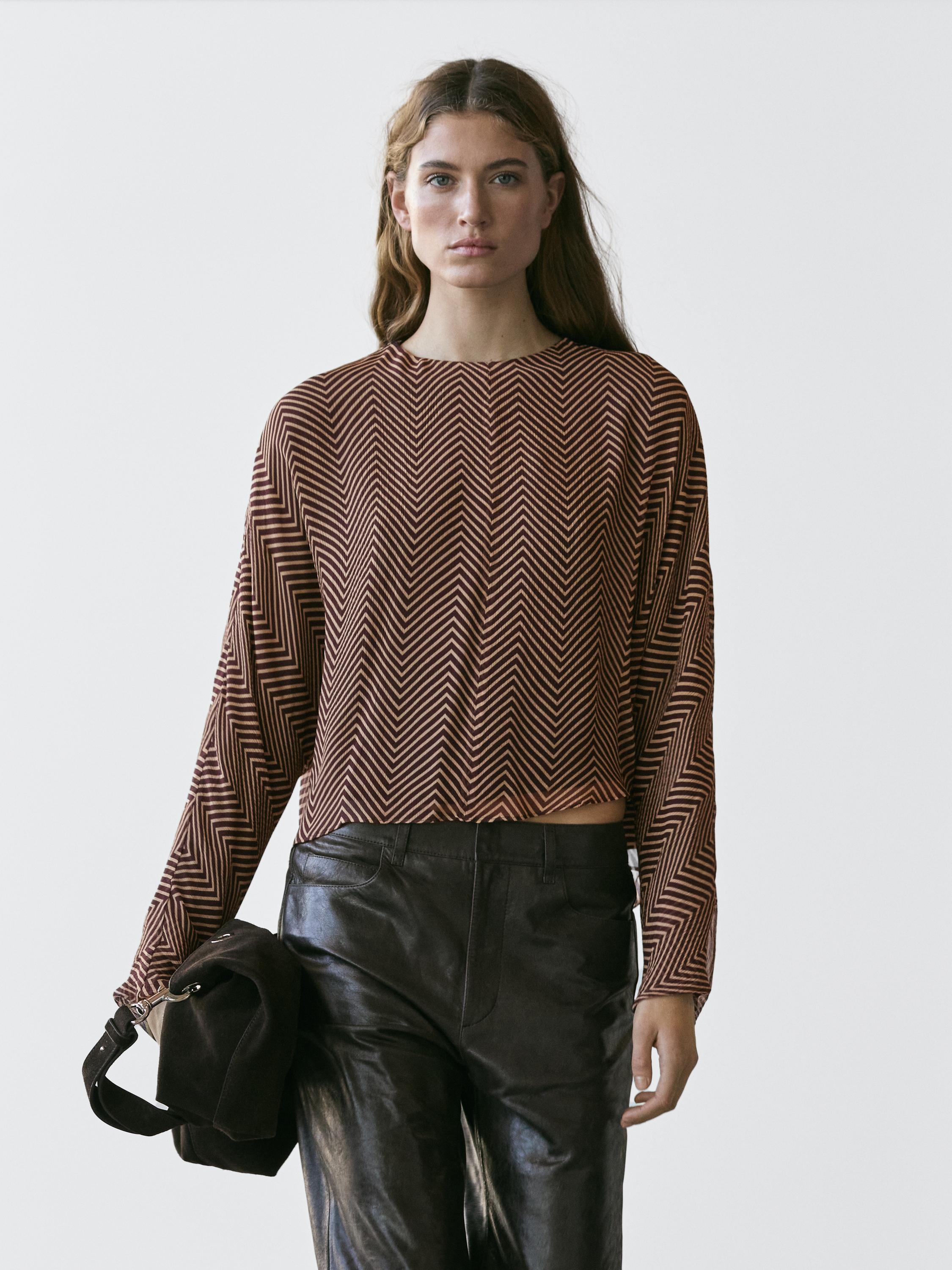Flowing geometric print blouse